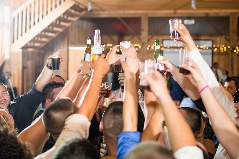 Wedding Guests Raise a Glass