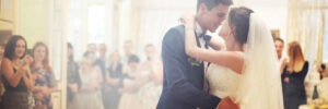 bride and groom dancing together at wedding reception